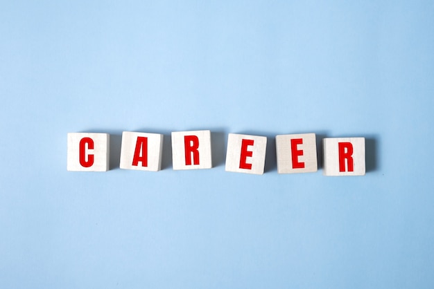 Photo career adviser assembling the word career with wooden cubes in a conceptual image of personal guidance towards self realization.