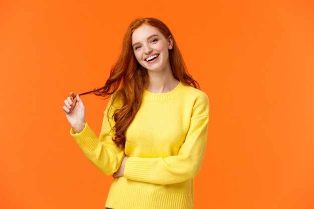 Carefree good-looking, smiling toothy redhead woman, woman with ginger hair laughing