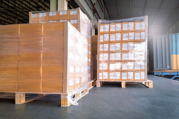 Cargo freight, Shipment, shipment, Delivery, Logistics and Freight transportation. Large pallet goods waiting for load into a truck container.