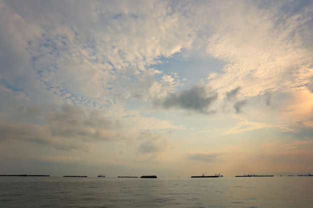 Cargo ships moored in the bay of Koh Sichang to unload goods