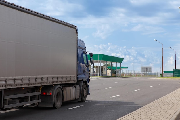 A cargo truck passes the checkpoint on BelarusianPolish border