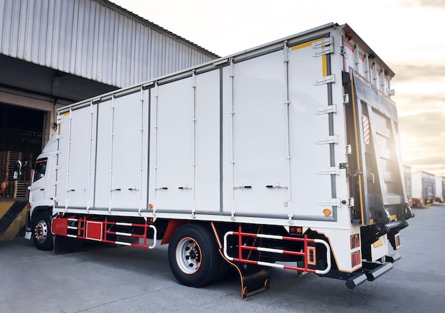 Cargo Trucks Parked at Warehouse Shipping Container Trucks Freight Logistics Transport