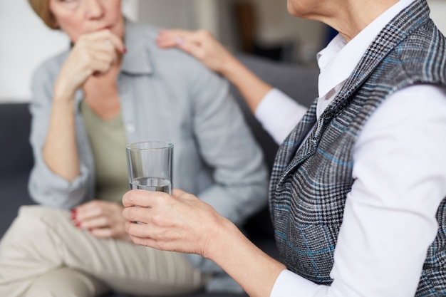 Caring Therapist Comforting Patient