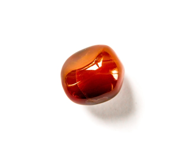 Carnelian agate gemstone isolated on a white background