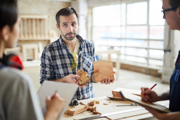 Carpenter Explaining Work