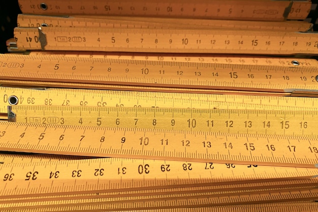 Carpenter's ruler many folding wooden rulers for carpenters