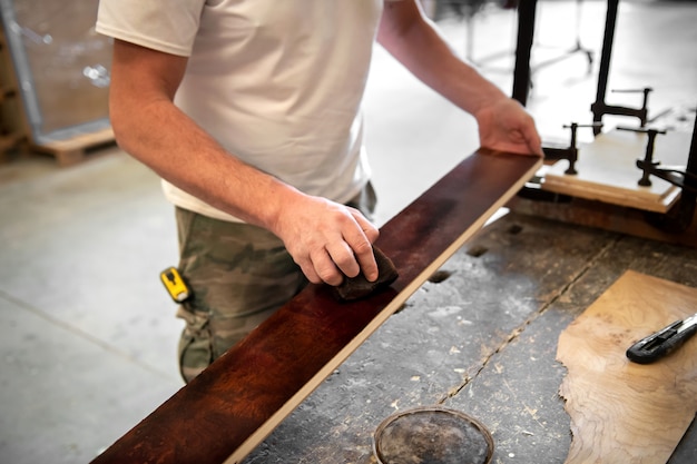 Carpenter or woodworker staining briar root sheet