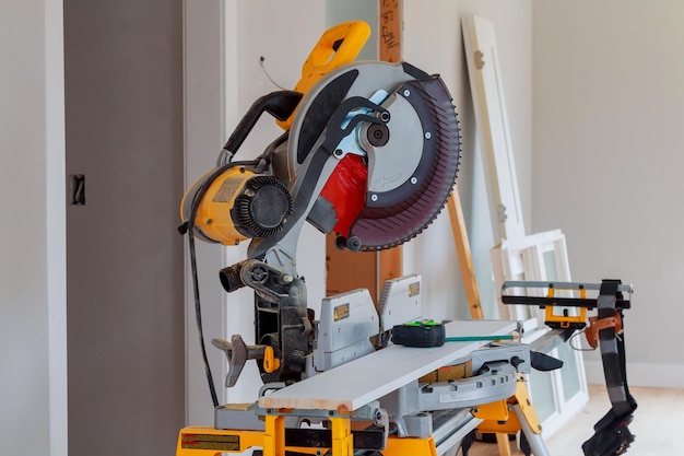 Carpenter workplace Man using circular saw to cut wood