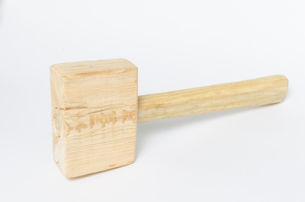 Carpenters tool mallet on a white background close up