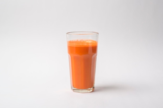 Carrot juice on white background healthy eating concept