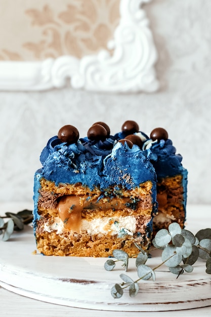 Carrot Vegetarian Cake with Nuts. Blue cake, modern dessert, simple decoration.