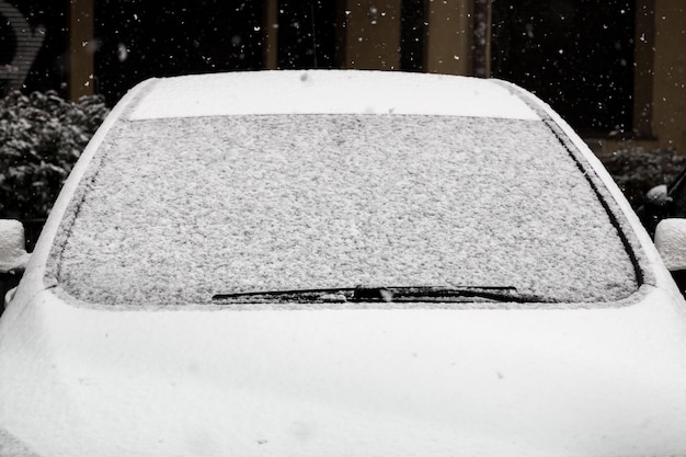 The cars are covered with snow in winter.