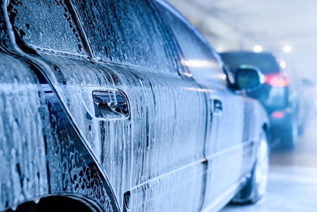 Cars in a car wash station