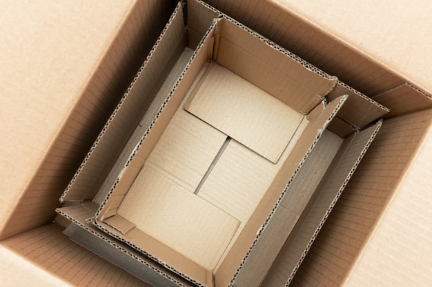 Carton, cardboard packages inside a paper box