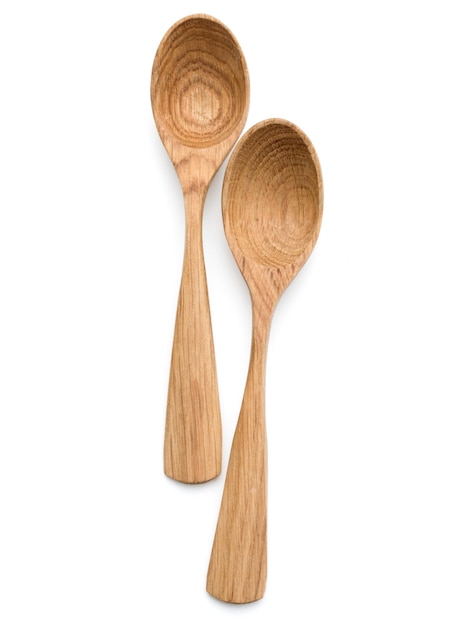 Carving wooden spoon isolated on white background cutout