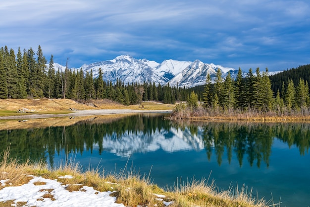 cascade ponds park in autumn snowcovered mount astley reflection on water banff national park