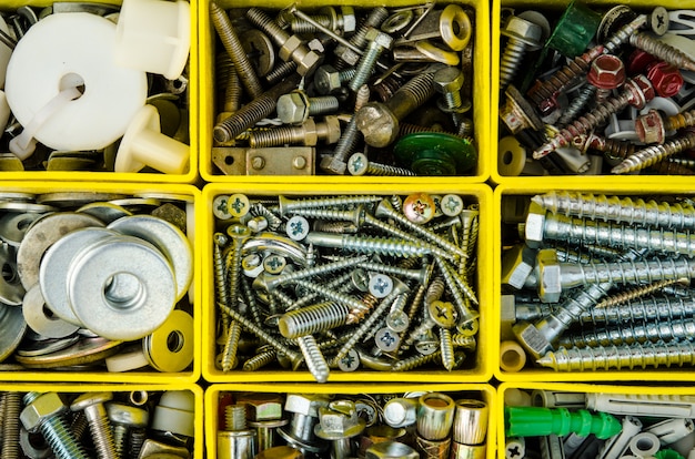 Case with small construction objects. Isolated tool box. Set metal work repair in box. 