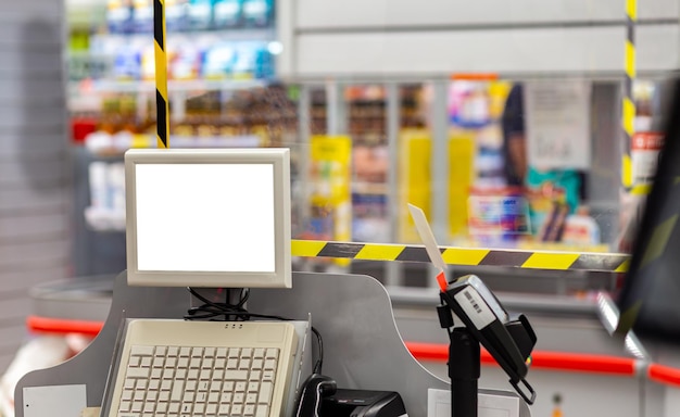 Cash register equipment with monitor mockup on blurred shop background