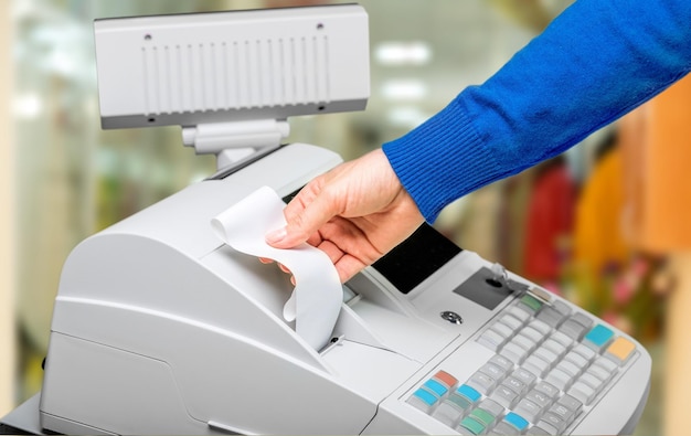 Cash register with LCD display and worker's