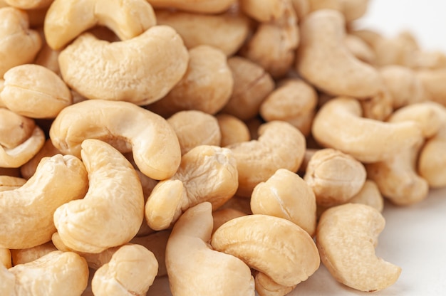 Cashew group. Close-up. White background . Isolated.