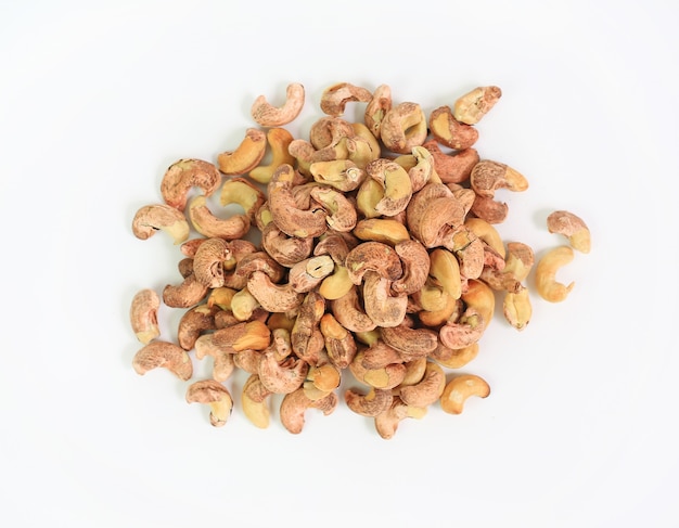 Cashew nuts with shell isolated on a white background. Above view