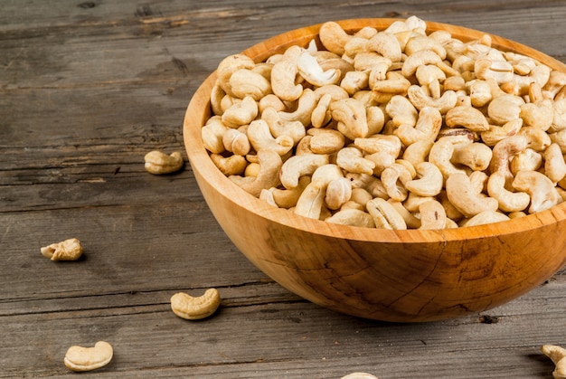 Cashew nuts in a wooden bowl