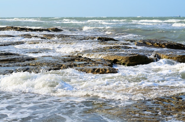 The Caspian Sea coast in stormy weather in the evening, Azerbaijan, Baku