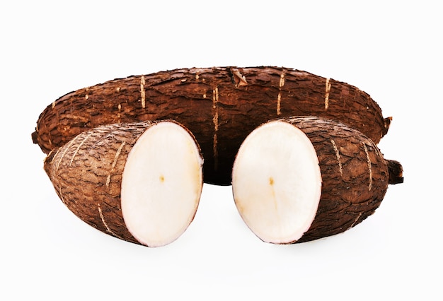 Cassava root on white background