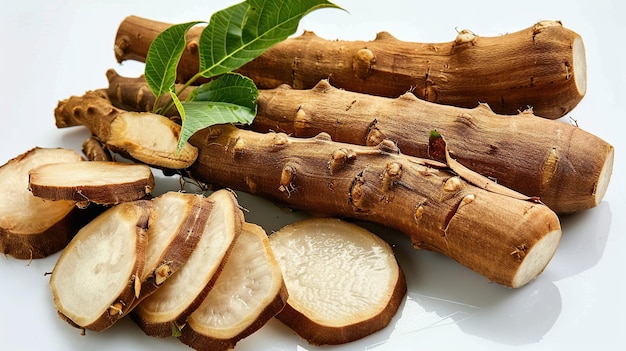 Cassava roots with slice isolated on a white background