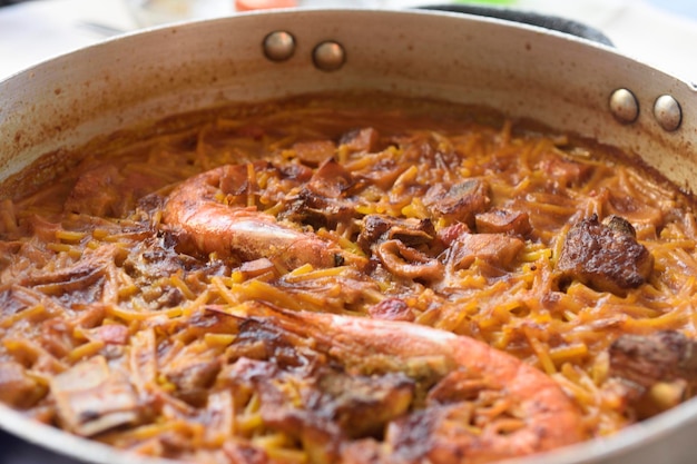 Casserole noodles sea and mountain Tossa de Mar Costa Brava Girona province CataloniaSpain