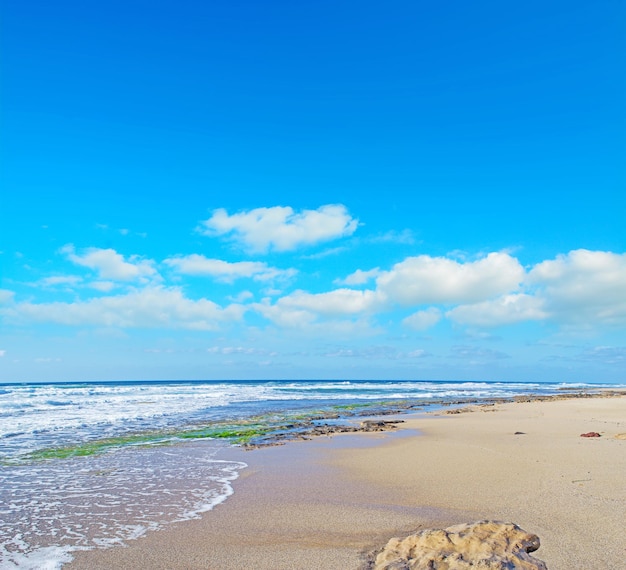 Castelsardo shore with waves Sardinia