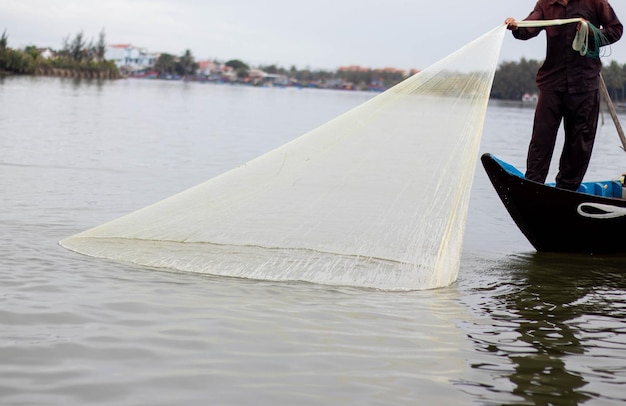 Casting a net to catch fish