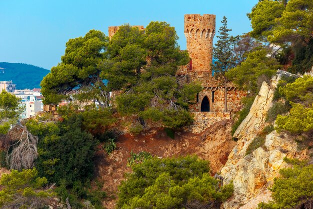 Castle on the beach in the northern part of the beach in popular holiday resort lloret de mar on cos...