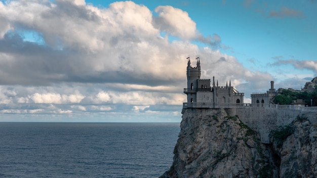 Castle Swallow's Nest on the cliff over the Black Sea close-up, Crimea, Yalta. One of the most popular tourist attraction of Crimea.