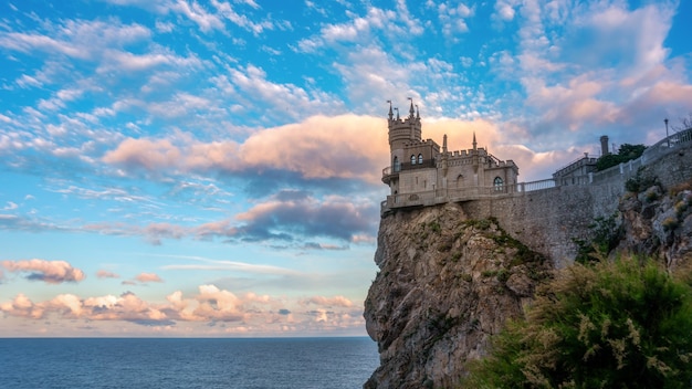 Castle Swallow's Nest on the cliff over the Black Sea close-up, Crimea, Yalta. One of the most popular tourist attraction of Crimea.