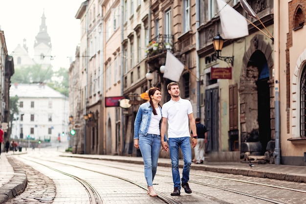 Casual cute couple walking through the city