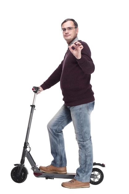 Casual man with electric scooter isolated on a white