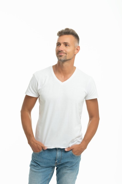 Casual means comfortable Happy guy on casual Handsome man isolated on white Caucasian dude keeps hands in pockets Adult male