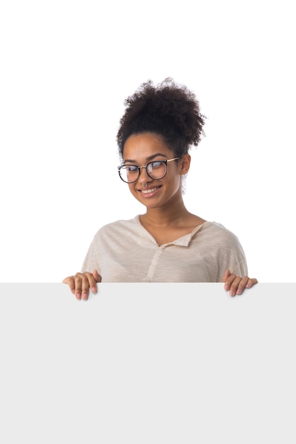 Casual woman displaying a banner