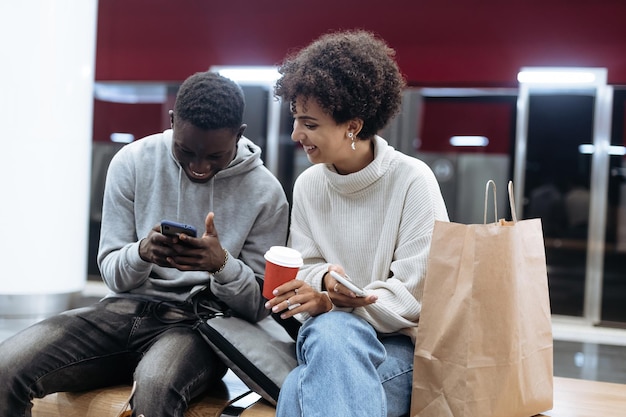 Casual young couple waiting for a subway train