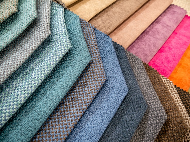 Catalog of colorful samples fabrics for making furniture Collection upholstery fabric blur