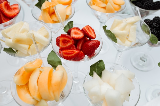 Catering cocktails with fruits on table