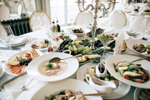 Catering service table with food and drink at restaurant before wedding partyx9