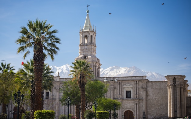 Cathedral and snowcapped volcano in Arequipa, Peru