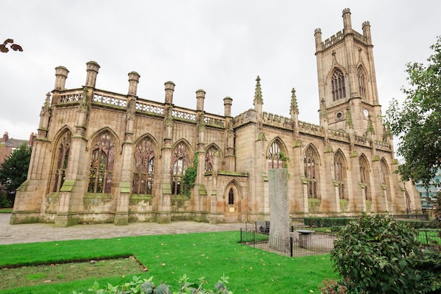 Catholic cathedral. Around the cathedral, a well-kept park and a confirmed lawn. Liverpool. England.