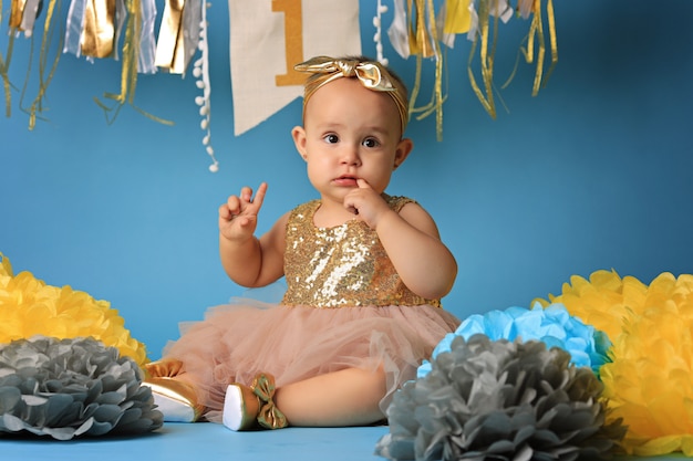 caucasian baby girl on her first birthday