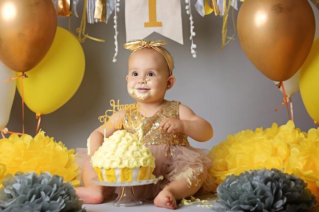 caucasian baby girl on her first birthday