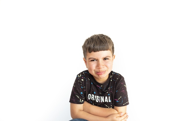 Caucasian child in a disgruntled pose