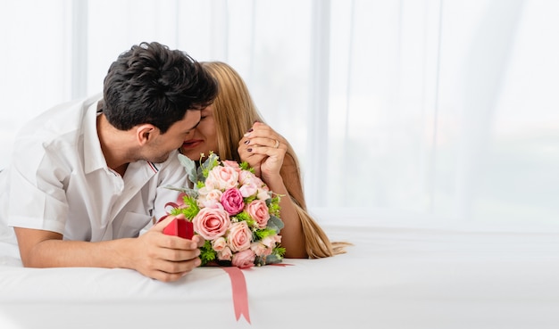 Caucasian couple happy with lover on bed in morning