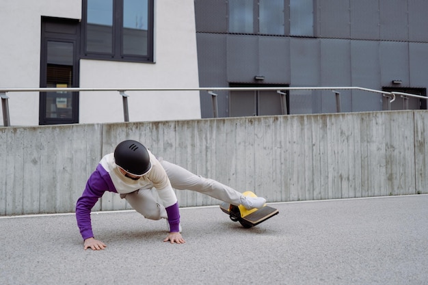 Caucasian man fallen while driving at electronic board electric vehicle High quality photo